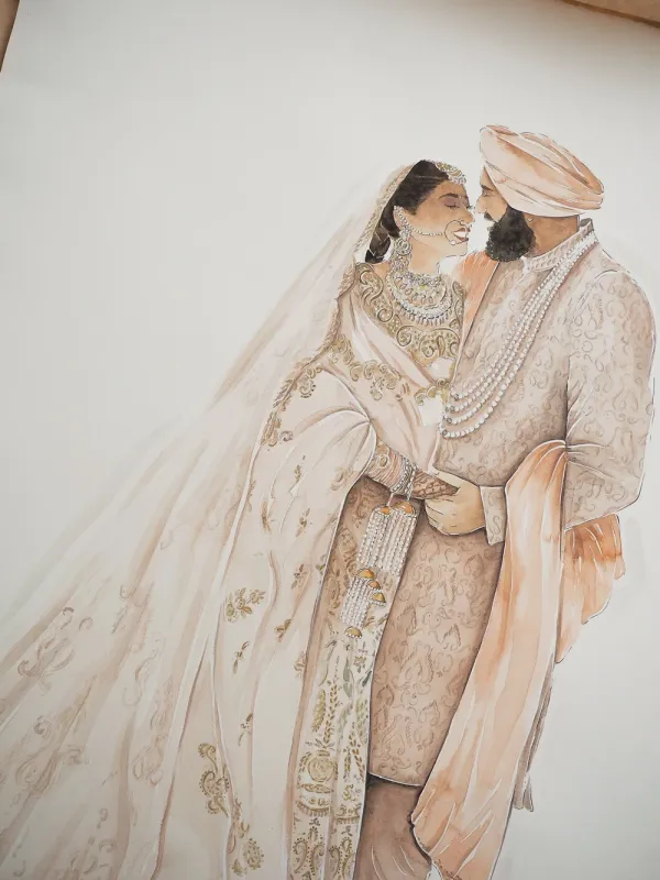 Watercolour painting of a couple in embroidered blush South Asian wedding attire with pearls and veil, by Adrienne Monteverde