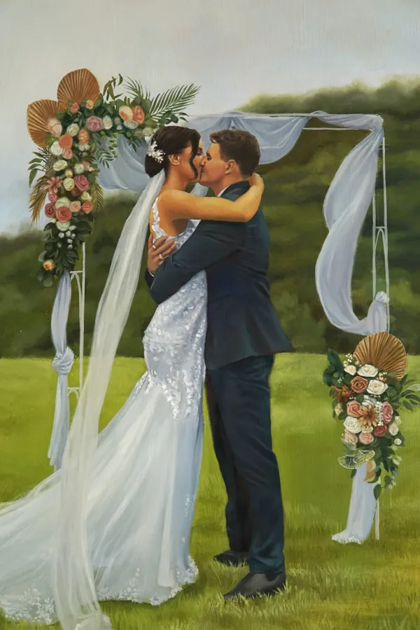 Oil painting of a bride and groom kissing under a draped floral arbour on a green lawn, by KT Live Wedding Painter