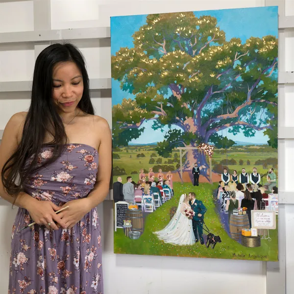 Artist beside her acrylic painting of a ceremony under a fig tree at Ben Ean, Hunter Valley, by Michelle Angelique Art