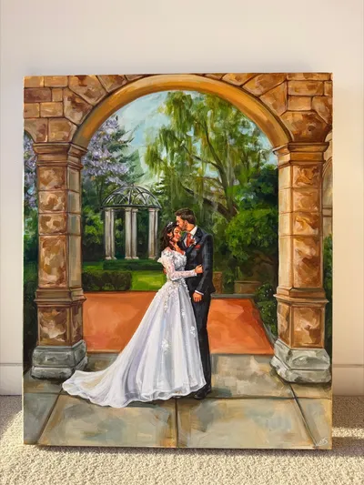 Painterly live wedding canvas of a couple embracing under a sandstone archway with a garden rotunda, by Painted Favours