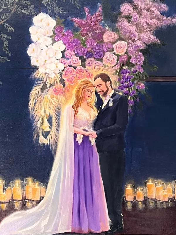 Live acrylic wedding painting of a couple under a candlelit floral arch at Rupert on Rupert by Risa Live Painting