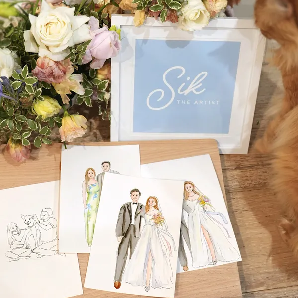 Watercolour guest portraits and a pet line sketch beside florals and a Sik The Artist sign, by Sik The Artist